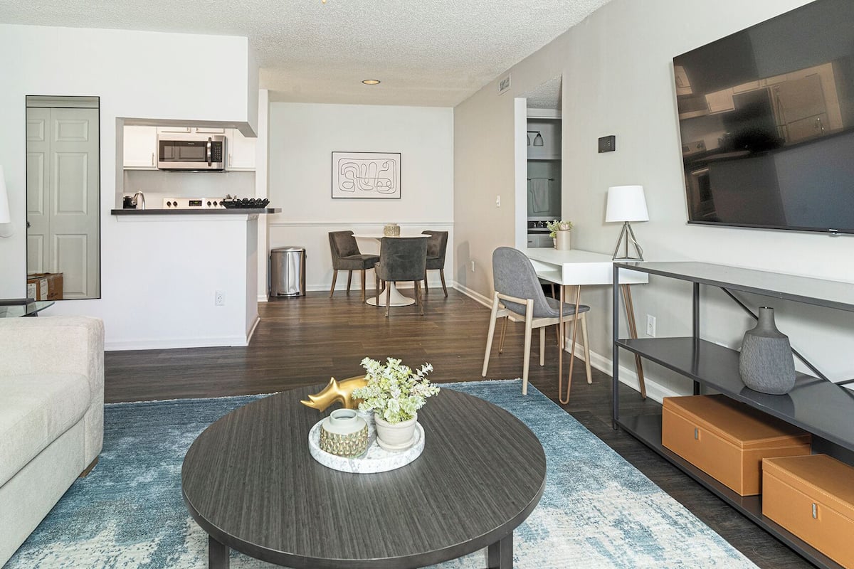 Apartment, 1 Bedroom | Living area | 50-inch Smart TV with digital channels, fireplace