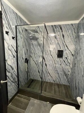 Shower, hair dryer, towels, soap