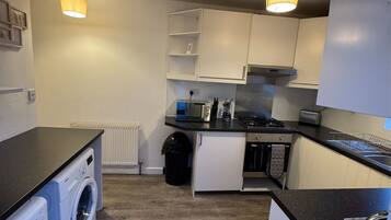 Fridge, oven, stovetop, cookware/dishes/utensils