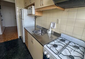 Apartamento, vistas a la ciudad | Cocina privada