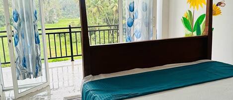 Deluxe Double or Twin Room, Balcony, Garden View | In-room safe, individually decorated, individually furnished, desk