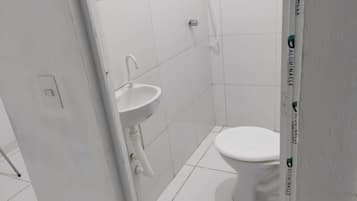 Shower, towels, soap, toilet paper