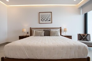 Premium bedding, down comforters, blackout drapes, soundproofing