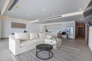 Apartament Deluxe, vistes a la platja | Sala d'estar