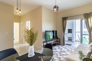 Basic Apartment | Living area | 32-inch Smart TV with digital channels