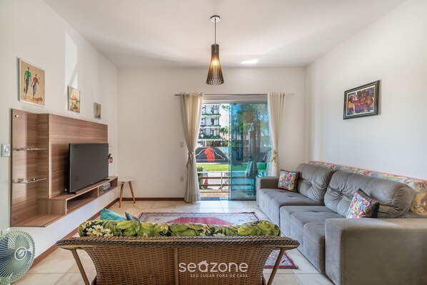 Basic Apartment | Living area | TV - Cozy Apartment Just 2 min From the Sea! - Vig0011 (Florianópolis)