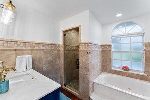 Jetted tub, hair dryer, towels, soap
