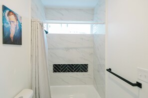 Hair dryer, towels, soap, toilet paper