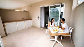 Quarto standard, vista para o jardim | Terraço/pátio