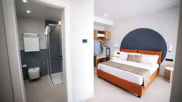 Deluxe Room, Patio | Minibar, in-room safe, individually decorated, individually furnished