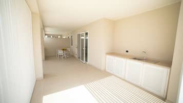 Superior Triple Room, Pool View | Terrace/patio
