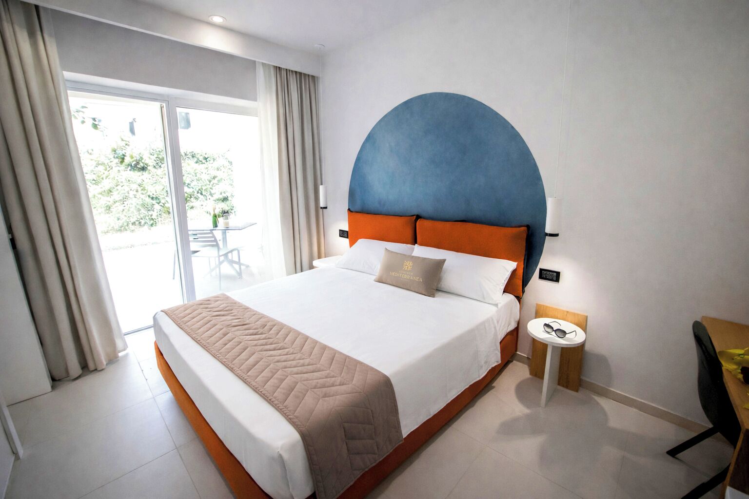 Deluxe Room, Patio | Minibar, in-room safe, individually decorated, individually furnished