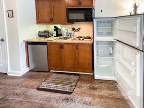 Fridge, microwave, stovetop, coffee/tea maker