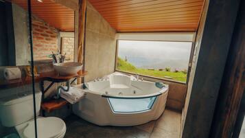 Jetted bath, hair dryer, towels, soap