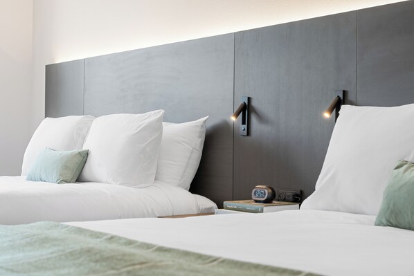 Ropa de cama de alta calidad, cubrecamas, escritorio y wifi gratis 