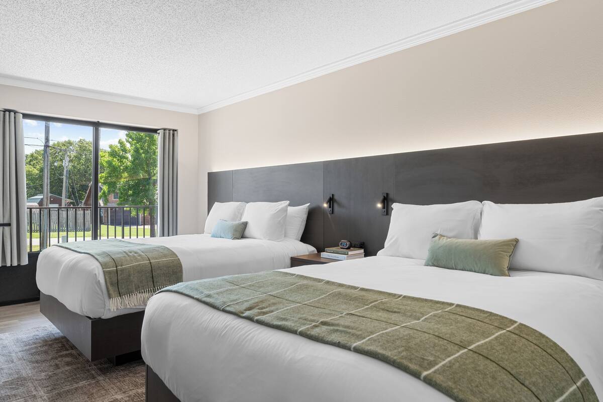 Premium bedding, down comforters, desk, laptop workspace