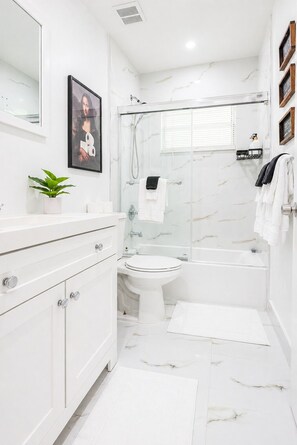 Shower, towels, toilet paper