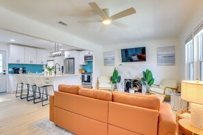 TV, fireplace - Private Hot Tub & Fenced Yard: Sleek Gulfport Home (Gulfport)