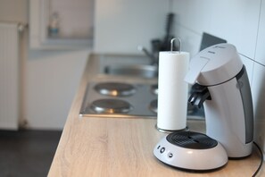 Fridge, microwave, stovetop, coffee/tea maker