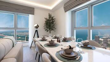 Premium Apartment, Balcony, Ocean View | In-room dining