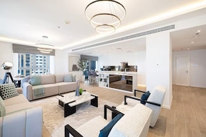 Premium Apartment, Balcony, Ocean View | Living area | Flat-screen TV