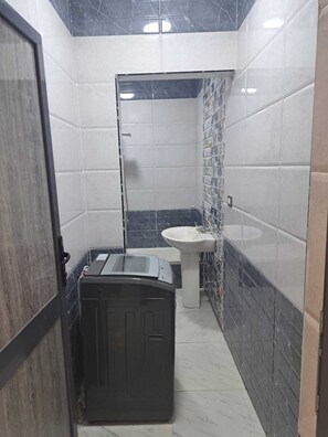 Shower, towels, soap, toilet paper