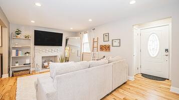 Smart TV, fireplace, books