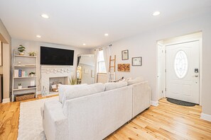 Smart TV, fireplace, books