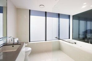 Shower, jetted tub, hair dryer, towels