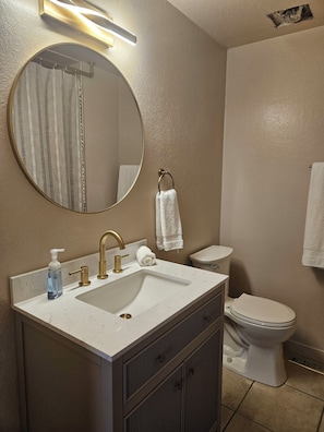 Hair dryer, towels, soap, toilet paper