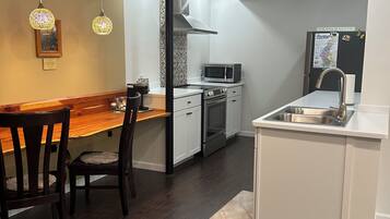 1 chambre, bureau, fer et planche à repasser, Wi-Fi gratuit