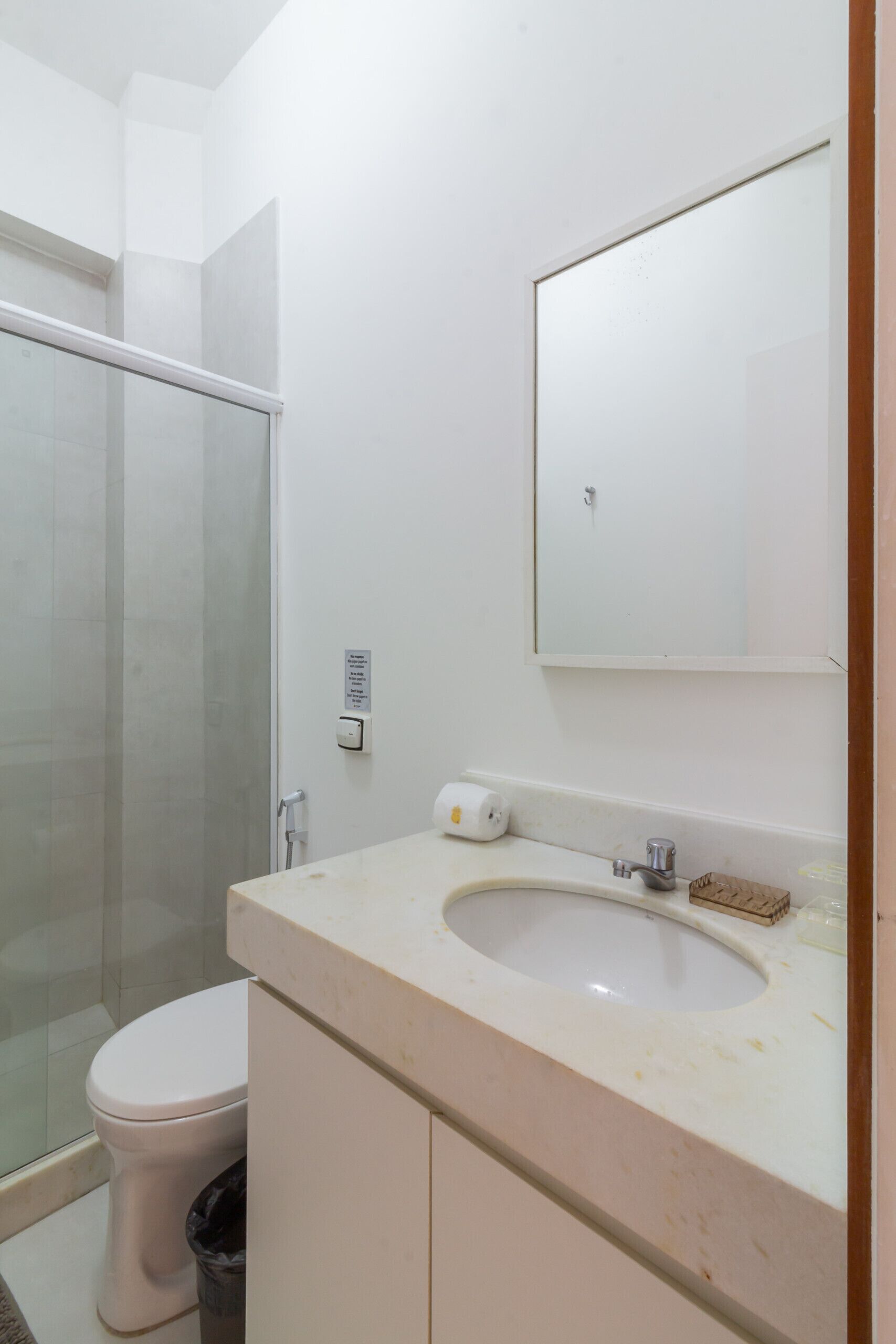 Shower, hair dryer, towels, shampoo