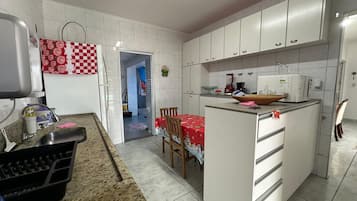 Premium House, Pool Access, Pool View | Private kitchen | Dining tables