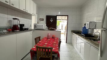 Premium House, Pool Access, Pool View | Private kitchen | Dining tables