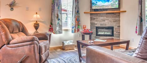 Smart TV, fireplace, books