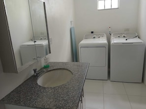 Shower, towels, soap, toilet paper