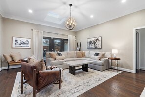 TV, fireplace - Lone Star Retreat - Game Room - Heated Pool & Spa (Carrollton)