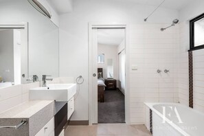 Shower, towels, soap, toilet paper
