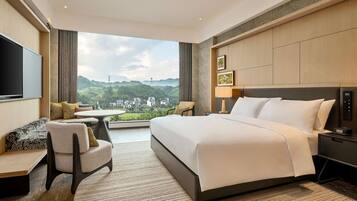 Kamer, 1 kingsize bed | Een minibar, een kluis op de kamer, een bureau, een laptopwerkplek