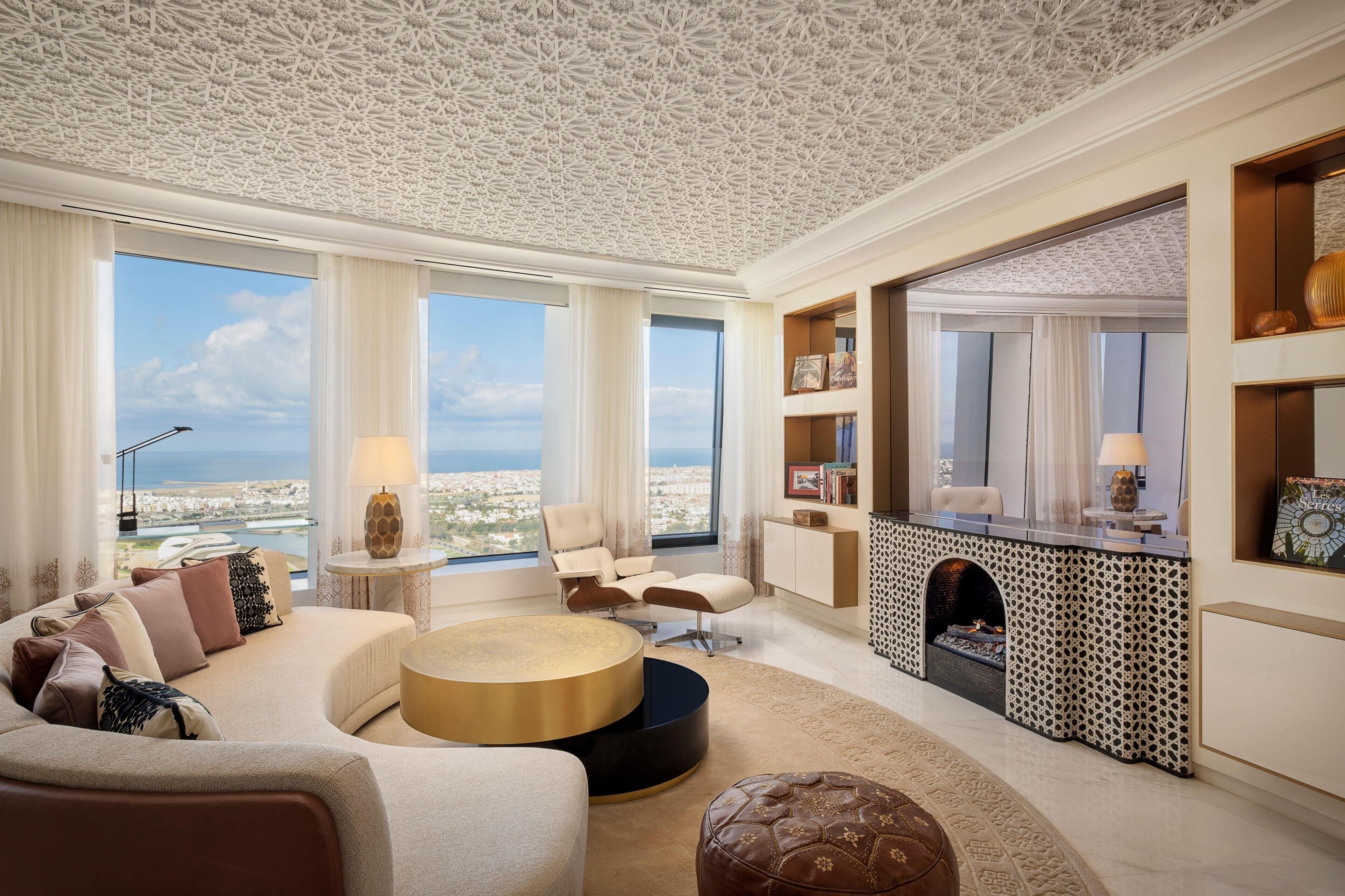 Suite, 1 King Bed (Diplomat) | Living area | Fireplace, heated floors, smart speakers