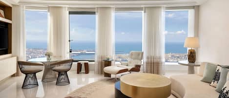 Deluxe Suite, 1 Bedroom, Bay View | Living area | Fireplace, heated floors, smart speakers