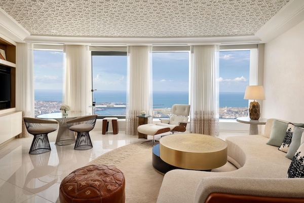 Deluxe Suite, 1 Bedroom, Bay View | Living area | Fireplace, heated floors, smart speakers