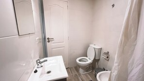 Hair dryer, towels, soap, toilet paper