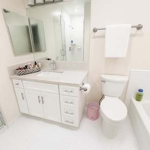 Shower, hair dryer, towels, soap