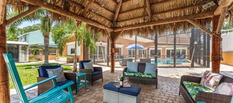 Tropical Riverfront Retreat w/ Pool, Spa, Tiki Hut & Dock! 🌴