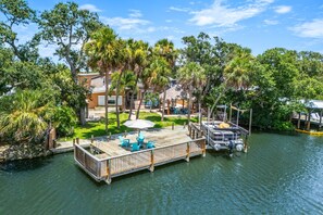 Terrace/patio - Tropical Riverfront Retreat w/ Pool, Spa, Tiki Hut & Dock! 🌴 (Cocoa Beach)