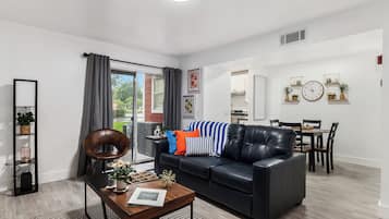 Standard Apartment, 1 Queen Bed with Sofa bed, Non Smoking, Patio | Living area | 75-inch flat-screen TV with digital channels, Netflix, Hulu