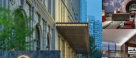 A hotel entrance with a modern facade, a well-lit interior with contemporary furnishings, and a clear view of the surrounding urban environment.