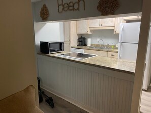 Fridge, microwave, oven, stovetop - Relax and Unwind at this cozy 2-bedroom first floor condo in Edisto Beach. (Edisto Island)