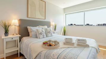 2 habitaciones, tabla de planchar con plancha y cuna de viaje